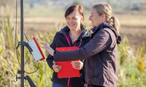 Surveying companies checking control points with field equipment to ensure accurate property measurements