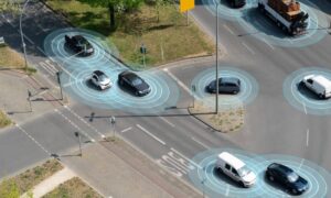 Autonomous vehicle intersection detection - ALTA SURVEY Oklahoma Cars at a busy intersection showing sensor detection rings similar to lidar mapping used for understanding traffic and surrounding road conditions