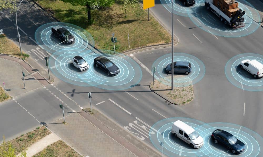 Autonomous vehicle intersection detection - ALTA SURVEY Oklahoma Cars at a busy intersection showing sensor detection rings similar to lidar mapping used for understanding traffic and surrounding road conditions